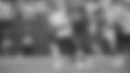 Taylor Heinicke scrambles away from pressure during the Washington Football Team's game against the Green Bay Packers. (Karlee Sell/Washington Football Team)