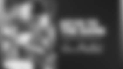 Jaret Patterson runs over a defender during the Washington Football Team's Week 15 game against the Philadelphia Eagles. (Emilee Fails/Washington Football Team)