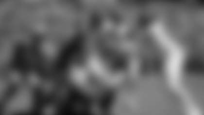 Washington Commanders running back Brian Robinson Jr. (8) scores a touchdown during the first half of a preseason NFL football game against the Carolina Panthers, Saturday, Aug. 13, 2022, in Landover, Md. (AP Photo/Nick Wass)