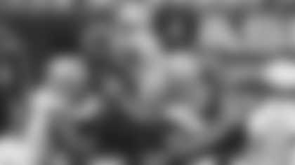 Jonathan Allen, Chase Young and Jon Bostic tackle Dalton Schultz during the Washington Football Team's 25-3 win over the Dallas Cowboys. (Elijah Walter Griffin/Washington Football Team)