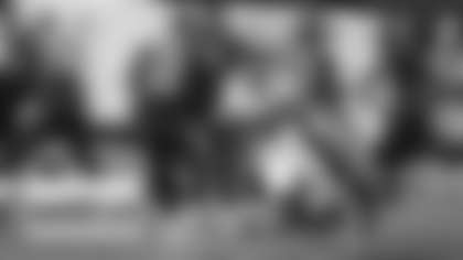 Chase Young tries to get a sack on Tom Brady during the Washington Football Team's matchup against the Tampa Bay Buccaneers. (Elijah Walter Griffin Sr./Washington Football Team)