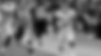 Washington Football Team strong safety Kamren Curl (31) runs back an interception for a touchdown as San Francisco 49ers quarterback Nick Mullens (4) tries to defend during the second half of an NFL football game, Sunday, Dec. 13, 2020, in Glendale, Ariz. (AP Photo/Ross D. Franklin)