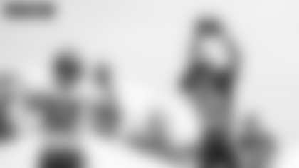 Jamin Davis makes an interception in the end zone against Ryan Fitzpatrick in practice. (Emilee Fails/Washington Football Team)