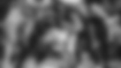 Washington defenders Shaka Toney and David Mayo take down Dallas' Tony Pollard. (Emilee Fails/Washington Football Team)