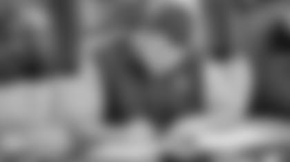 Go-Behind-the-Scenes-As-Martin-Signs-New-Deal-hero