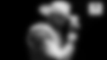 CowBuzz-Dak-Tips-His-Cowboy-Hat-After-Signing-hero