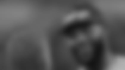 Dallas Cowboy head coach Jason Garrett talks with the NBA's Miami Heat's Lebron James on the sideline before the Dallas Cowboys and New York Giants played at AT&T Stadium during an NFL game in Dallas, Texas on Sunday, September 8, 2013. (AP Photo/Layne Murdoch)