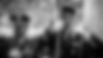 Military members hold the flag during the national anthem prior to an NFL football game against the New York Giants, Sunday, Dec. 5, 2021, in 91 Gardens, Fla. (91 Dolphins)