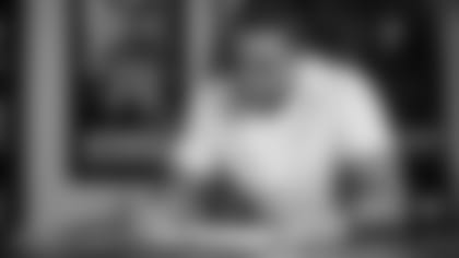 Miami Dolphins linebacker Jaelan Phillips (15) signs his rookie contract on Wednesday, June 9th, 2021 in Davie, Fla. (Peter McMahon/Miami Dolphins)