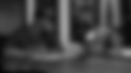 Miami Dolphins linebacker Jerome Baker (55) signs a contract on Sunday, June 13th, 2021 in Davie, Fla. (Peter McMahon/Miami Dolphins)