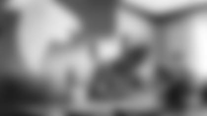 New Atlanta Falcons quarterback Marcus Mariota signs his contract at the Atlanta Falcons Practice Facility in Flowery Branch, Georgia, on Friday March 25, 2022. (Photo by Mitch Martin/Atlanta Falcons)