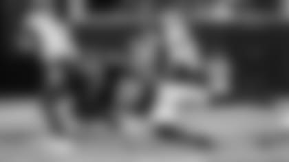 Atlanta Falcons defensive end Marlon Davidson #90 gets a sack against the Tennessee Titans at Mercedes-Benz Stadium in Atlanta, Georgia on Friday, August 13, 2021. (Photo by Casey Sykes/Atlanta Falcons)