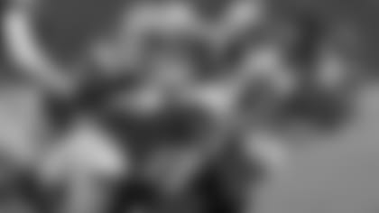 Atlanta Falcons wide receiver Julio Jones is hit after making a catch by Green Bay Packers strong safety Morgan Burnett (42) defensive end Datone Jones (95) and cornerback Sam Shields (37) during an NFL football game Monday Dec. 8, 2014, in Green Bay, Wis. (AP Photo/Matt Ludtke)