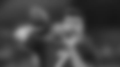 North Carolina quarterback Sam Howell runs a drill during the NFL football scouting combine, Thursday, March 3, 2022, in Indianapolis. (AP Photo/Darron Cummings)