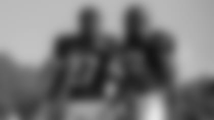 Atlanta Falcons safety Richie Grant #27 laughs with strong safety Duron Harmon #21 during AT&T Atlanta Falcons Training Camp at Atlanta Falcons Headquarters in Flowery Branch, Georgia, on Thursday August 5, 2021. (Photo by Kara Durrette/Atlanta Falcons)