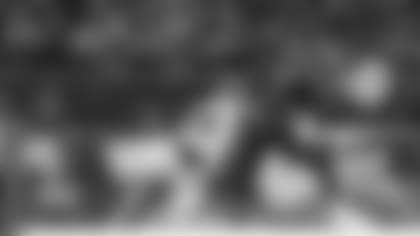 New York Giants outside linebacker Lorenzo Carter (59) forces a fumble by Philadelphia Eagles quarterback Jalen Hurts (1) during the first quarter of an NFL football game Sunday, Dec. 26, 2021, in Philadelphia. (AP Photo/Rich Schultz)