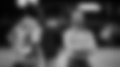 Atlanta Falcons general manager Terry Fontenot is seen on the field talking with running back Cordarrelle Patterson #84 prior to a game against the New England Patriots at Mercedes-Benz Stadium in Atlanta, Georgia on Thursday, November 18, 2021. (Photo by Kyle Hess/Atlanta Falcons)