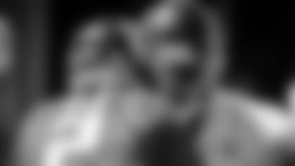 Atlanta Falcons tight end Kyle Pitts #8 listens to quarterback Matt Ryan #2 in the huddle during organized team activities on June 16, 2021.