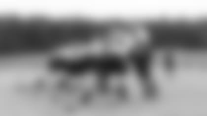 Atlanta Falcons offensive tackle Kaleb McGary #76, offensive lineman Jason Spriggs, and the offensive line run a drill during team practice at Atlanta Falcons Headquarters in Flowery Branch, Georgia, on Thursday September 30, 2021. (Photo by Dakota Williams/Atlanta Falcons)