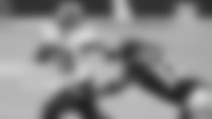 Tennessee Titans wide receiver Cameron Batson (13) runs the ball against Baltimore Ravens free safety DeShon Elliott (32) during the first half of an NFL football game, Sunday, Nov. 22, 2020, in Baltimore. (AP Photo/Terrance Williams)