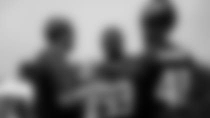 Atlanta Falcons linebacker Erroll Thompson #53 and linebacker Dorian Etheridge #48 listen to Matt Pees during 2021 Atlanta Falcons Minicamp on June 9, 2021.