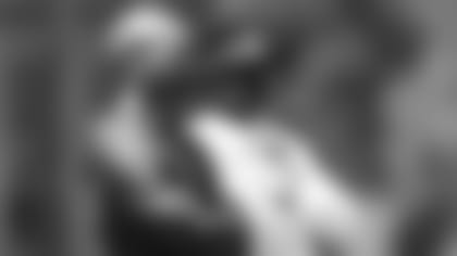 Atlanta Falcons legend Harry Douglas talks to general manager Terry Fontenot during organized team activities on June 17, 2021.