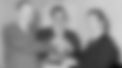 Wellington T. Mara, owner of the New York Giants of the NFL, and Giants head coach Allie Sherman, right, pose with Harland Svare, who was named Giants defensive coach, Feb. 15, 1967, in New York City. (AP Photo)