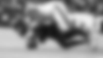 New York Giants defensive tackle Dexter Lawrence (97) forces Washington Commanders quarterback Taylor Heinicke (4) to fumble during an NFL football game, Sunday, December 12, 2022 in Landover. (AP Photo/Daniel Kucin Jr.)