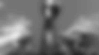 In this image taken with a slow shutter speed, the Vince Lombardi Trophy is displayed before a news conference for the NFL Super Bowl 53 football game Wednesday, Jan. 30, 2019, in Atlanta. (AP Photo/David J. Phillip)