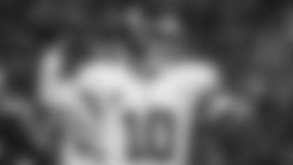 New York Giants quarterback Eli Manning passes in the first half of an NFL football game against the Chicago Bears, Thursday, Oct. 10, 2013, in Chicago. (AP Photo/Charles Rex Arbogast)