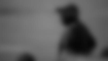 Jacksonville Jaguars head coach Doug Marrone watches game action from the sideline while wearing a facemask during an NFL football game against the Tennessee Titans, Sunday, Sept. 20, 2020, in Nashville, Tenn. (AP Photo/Brett Carlsen)