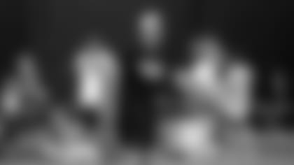 Jacksonville Jaguars defensive line coach Joe Cullen wears protective arm pads while yelling instructions during NFL football training camp Saturday, July 30, 2011, in Jacksonville, Fla. (AP Photo/Rick Wilson)