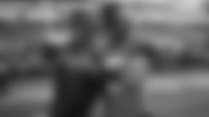 Jacksonville Jaguars quarterback Gardner Minshew (15) and offensive coordinator John DeFilippo talk prior to a game against the Tennessee Titans, Thursday, Sept. 19, 2019, in Jacksonville, Fla. Jacksonville won 20-7. (Logan Bowles via AP)