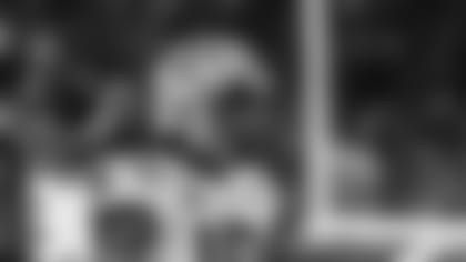 LSU linebacker K'Lavon Chaisson (18) walks back to the sideline during the Peach Bowl NCAA semifinal college football playoff game against Oklahoma, Saturday, Dec. 28, 2019, in Atlanta. (AP Photo/Danny Karnik)