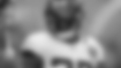 Jacksonville Jaguars running back Leonard Fournette reacts while talking to teammates prior to an NFL football preseason game against the Baltimore Ravens, Thursday, Aug. 8, 2019, in Baltimore. (AP Photo/Julio Cortez)