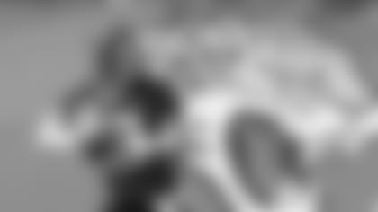 Jacksonville Jaguars quarterback Trevor Lawrence runs a drill during an NFL football practice, Tuesday, June 15, 2021, in Jacksonville, Fla. (AP Photo/John Raoux)