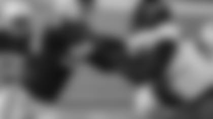 Jacksonville Jaguars offensive lineman Cam Robinson (74) blocks Indianapolis Colts defensive tackle DeForest Buckner (99) during an NFL football game on Sunday, Jan. 3, 2021, in Indianapolis. (AP Photo/Zach Bolinger)