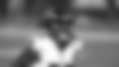 Baltimore Ravens defensive end Jihad Ward (53) celebrates a sack against Tennessee Titans quarterback Ryan Tannehill (17) during the second quarter an NFL wild-card playoff football game, Sunday, Jan. 10, 2021, in Nashville, Tenn. Ravens defeat Titans 20-13. (AP Photo/Brett Carlsen)