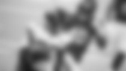 Jacksonville Jaguars running back James Robinson (30) runs from Minnesota Vikings linebacker Todd Davis (40) during the first half of an NFL football game, Sunday, Dec. 6, 2020, in Minneapolis. (AP Photo/Bruce Kluckhohn)