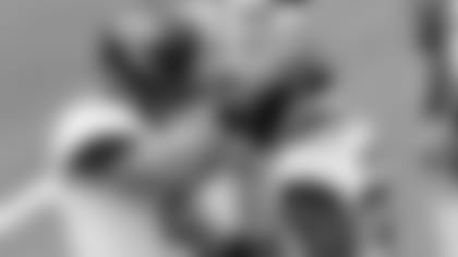 Jacksonville Jaguars quarterback Gardner Minshew, left, celebrates with running back James Robinson, right, after scoring against the Los Angeles Chargers during the first half of an NFL football game Sunday, Oct. 25, 2020, in Inglewood, Calif. (AP Photo/Alex Gallardo)