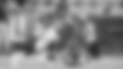 Jacksonville Jaguars Ryquell Armstead (30) runs around the tackle of Atlanta Falcons defensive back Parker Baldwin (43) during the first half of an NFL preseason football game, Thursday, Aug. 29, 2019, in Jacksonville, Fla. (AP Photo/Stephen B. Morton)