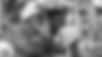 Jacksonville Jaguars defensive coordinator Todd Wash, left, talks with middle linebacker Myles Jack (44) during an NFL football practice at the teams training facility, Thursday, Aug. 1, 2019, in Jacksonville, Fla. (AP Photo/John Raoux)