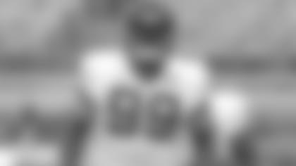 Jacksonville Jaguars defensive tackle Marcell Dareus (99) warms up during an NFL football practice at the teams stadium, Friday, Aug. 2, 2019, in Jacksonville, Fla. (AP Photo/John Raoux)