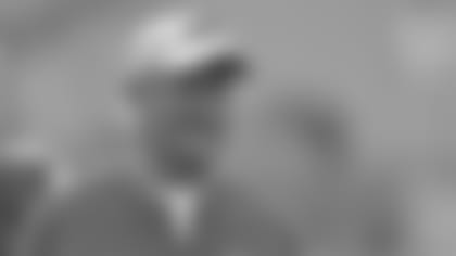 Buffalo Bills wide receivers coach Terry Robiskie walks on the field before an NFL football preseason game against the Cleveland Browns, Friday, Aug. 17, 2018, in Cleveland. Buffalo won 19-17. (AP Photo/David Richard)