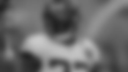 Jacksonville Jaguars running back Leonard Fournette reacts while talking to teammatprior to an NFL football preseason game, Thursday, Aug. 8, 2019, in Baltimore. (AP Photo/Julio Cortez)