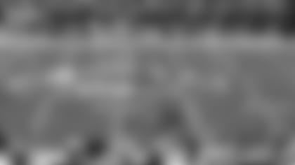 Midfield, line of scrimmage action shows all 22 players during Jacksonville Jaguars - Miami Dolphins Jan. 15, 2000 divisional game in Jacksonville, Fla. (AP Photo / Al Messerschmidt)