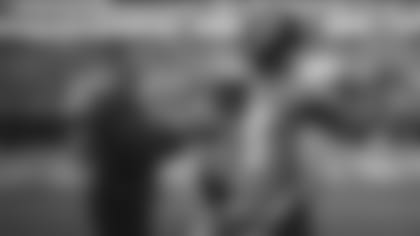 Jacksonville Jaguars quarterback Gardner Minshew (15) and offensive coordinator John DeFilippo talk prior to a game against the Tennessee Titans, Thursday, Sept. 19, 2019, in Jacksonville, Fla. Jacksonville won 20-7. (Logan Bowles via AP)