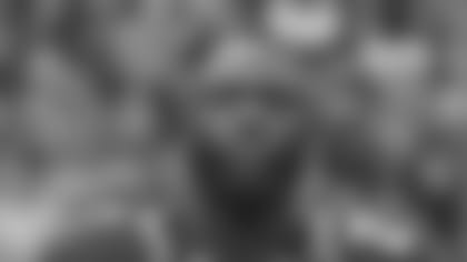 Jacksonville Jaguars running back Leonard Fournette (27) listens to the national anthem before kick-off against the Houston Texans in an NFL game, Sunday, Nov. 3, 2019 in London. (Rick Wilson via AP)