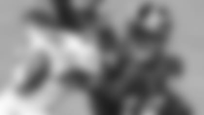 Pittsburgh Steelers wide receiver JuJu Smith-Schuster (19) tries to fend off Baltimore Ravens cornerback Tramon Williams after making a catch during the second half of an NFL football game Wednesday, Dec. 2, 2020, in Pittsburgh. (AP Photo/Don Wright)