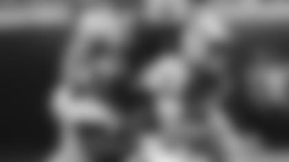 Jacksonville Jaguars defensive end Yannick Ngakoue, lower left, sacks New York Jets quarterback Sam Darnold (14) during the first half of an NFL football game, Sunday, Sept. 30, 2018, in Jacksonville, Fla. (AP Photo/Stephen B. Morton)